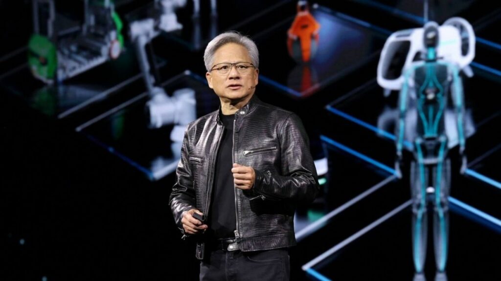 Jensen Huang on stage at CES 2025 with gaming graphics, AI symbols, and GPU hardware in the background.